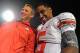 STATE COLLEGE, PA - OCTOBER 27: Quarterback Braxton Miller #5 of the Ohio State Buckeyes smiles with head coach Urban Meyer of the Ohio State Buckeyes after defeating the Penn State Nittany Lions at Beaver Stadium on October 27, 2012 in State College, Pennsylvania. The Ohio State Buckeyes won, 35-23. (Photo by Patrick Smith/Getty Images)