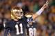 Sep 22, 2012; South Bend, IN, USA; Notre Dame Fighting Irish quarterback Tommy Rees (11) signals a first down for the Irish in the fourth quarter against the Michigan Wolverines at Notre Dame Stadium. Notre Dame won 13-6. Mandatory Credit: Matt Cashore-USA TODAY Sports