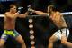 Aug 31, 2013; Milwaukee, WI, USA; Benson Henderson (right) fights Anthony Pettis during the UFC-164 bout at BMO Harris Bradley Center. at BMO Harris Bradley Center. Mandatory Credit: Benny Sieu-USA TODAY Sports