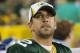 Aug 9, 2013; Green Bay, WI, USA; Green Bay Packers quarterback Aaron Rodgers (12) looks on during the fourth quarter against the Arizona Cardinals at Lambeau Field. The Cardinals won 17-0. Mandatory Credit: Jeff Hanisch-USA TODAY Sports