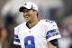Aug 29, 2013; Arlington, TX, USA; Dallas Cowboys quarterback Tony Romo (9) smiles while on the field before the game against the Houston Texans at AT&T Stadium. Mandatory Credit: Tim Heitman-USA TODAY Sports