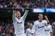 MADRID, SPAIN - JANUARY 27: Cristiano Ronaldo (L) of Real Madrid CF celebrates with Mesut Ozil after scoreding Real's 2nd goal during the La Liga match between Real Madrid CF and Getafe CF at estadio Santiago Bernabeu on January 27, 2013 in Madrid, Spain. (Photo by Denis Doyle/Getty Images)