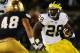 SOUTH BEND, IN - SEPTEMBER 22: Running back Fitzgerald Toussaint #28 of the Michigan Wolverines runs against linebacker Dan Fox #48 of the Notre Dame Fighting Irish in the third quarter at Notre Dame Stadium on September 22, 2012 in South Bend, Indiana. (Photo by Jonathan Daniel/Getty Images)