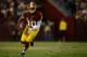 LANDOVER, MD - JANUARY 06: Robert Griffin III #10 of the Washington Redskins runs the ball against the Seattle Seahawks during the NFC Wild Card Playoff Game at FedExField on January 6, 2013 in Landover, Maryland. (Photo by Patrick McDermott/Getty Images)
