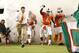 MIAMI, FL - SEPTEMBER 17: Head Coach Al Golden of the Miami Hurricanes leads the team onto the field for his first home game against the Ohio State Buckeyes on September 17, 2011 at Sun Life Stadium in Miami, Florida. The Hurricanes defeated the Buckeyes 24-6. (Photo by Joel Auerbach/Getty Images)
