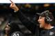 NEW ORLEANS, LA - AUGUST 16: Dennis Allen, head coach of the Oakland Raiders reacts to a turnover against the New Orleans Saints during a preseason game at the Mercedes-Benz Superdome on August 16, 2013 in New Orleans, Louisiana. (Photo by Stacy Revere/Getty Images)