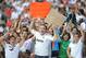 MADRID, SPAIN - SEPTEMBER 02: Real Madrid fans cheer as the wait for the arrival of Gareth Bale during his official unveiling at estadio Santiago Bernabeu on September 2, 2013 in Madrid, Spain. (Photo by Denis Doyle/Getty Images)