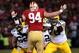 SAN FRANCISCO, CA - JANUARY 12: Defensive end Justin Smith #94 of the San Francisco 49ers in action against the Green Bay Packers offensive line during the NFC Divisional Playoff Game at Candlestick Park on January 12, 2013 in San Francisco, California. (Photo by Stephen Dunn/Getty Images)