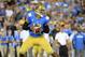 Quarterback Brett Hundley makes a pass against Nebraska.