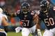 CHICAGO, IL - AUGUST 15: Jonathan Bostic #57 and James Anderson #50 of the Chicago Bears move with the play against the San Diego Chargers at Soldier Field on August 15, 2013 in Chicago, Illinois. (Photo by Jonathan Daniel/Getty Images)