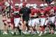 April 13, 2013; Stanford, CA, USA; Stanford Cardinal head coach David Shaw (black polo) leads his team onto the field during the Cardinal & White spring game at Stanford Stadium. Mandatory Credit: Kyle Terada-USA TODAY Sports