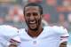 SAN DIEGO, CA - AUGUST 29: Colin Kaepernick #7 of the San Francisco 49ers laughs as he returns to the locker room after a warm up before a preseason game against the San Diego Chargers at Qualcomm Stadium on August 29, 2013 in San Diego, California. (Photo by Harry How/Getty Images)