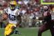 COLLEGE STATION, TX - OCTOBER 20: Michael Ford #42 of the LSU Tigers runs for a touchdown against Steven Jenkins #45 of the Texas A&M Aggies at Kyle Field on October 20, 2012 in College Station, Texas. (Photo by Ronald Martinez/Getty Images)