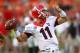 CLEMSON, SC - AUGUST 31: Aaron Murray #11 of the Georgia Bulldogs passes during warm ups prior to the game against the Clemson Tigers at Memorial Stadium on August 31, 2013 in Clemson, South Carolina. (Photo by Streeter Lecka/Getty Images)