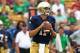 SOUTH BEND, IN - AUGUST 31: Tommy Rees #11 of the Notre Dame Fighting Irish passes against the Temple Owls at Notre Dame Stadium on August 31, 2013 in South Bend, Indiana. Notre Dame defeated Temple 28-6. (Photo by Jonathan Daniel/Getty Images)