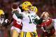 SAN FRANCISCO, CA - JANUARY 12: Quarterback Aaron Rodgers #12 of the Green Bay Packers throws the ball against the San Francisco 49ers in the first quarter during the NFC Divisional Playoff Game at Candlestick Park on January 12, 2013 in San Francisco, California. (Photo by Stephen Dunn/Getty Images)