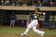 Sep 3, 2013; Oakland, CA, USA; Oakland Athletics right fielder Michael Choice (35) hits an infield single against the Texas Rangers during the fifth inning at O.co Coliseum. Mandatory Credit: Kelley L Cox-USA TODAY Sports