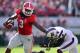 Sep 7, 2013; Athens, GA, USA; Georgia Bulldogs running back Todd Gurley (3) straight arms South Carolina Gamecocks cornerback Ahmad Christian (4) during the second quarter at Sanford Stadium. Mandatory Credit: Dale Zanine-USA TODAY Sports