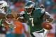 MIAMI GARDENS, FL - DECEMBER 11: Michael Vick #7 of the Philadelphia Eagles scrambles during a game against the Miami Dolphins at Sun Life Stadium on December 11, 2011 in Miami Gardens, Florida. (Photo by Mike Ehrmann/Getty Images)