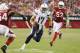 GLENDALE, AZ - AUGUST 24: Quarterback Philip Rivers #17 of the San Diego Chargers scrambles with the football during the preseason NFL game against the Arizona Cardinals at the University of Phoenix Stadium on August 24, 2013 in Glendale, Arizona. (Photo by Christian Petersen/Getty Images)