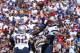 ORCHARD PARK, NY - SEPTEMBER 8: Tom Brady #12 of the New England Patriots throws a pass under pressure during NFL game action against the Buffalo Bills at Ralph Wilson Stadium on September 8, 2013 in Orchard Park, New York. (Photo by Tom Szczerbowski/Getty Images)