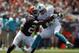 CLEVELAND, OH - SEPTEMBER 08: Wide receiver Brandon Gibson #10 of the Miami Dolphins makes a catch in front of defensive back Chris Owens #21 of the Cleveland Browns at Cleveland Browns Stadium on September 8, 2013 in Cleveland, Ohio. (Photo by Matt Sullivan/Getty Images)
