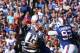 ORCHARD PARK, NY - SEPTEMBER 8: Tom Brady #12 of the New England Patriots throws an incomplete pass during NFL game action as he is hit by Jerry Hughes #55 of the Buffalo Bills at Ralph Wilson Stadium on September 8, 2013 in Orchard Park, New York. (Photo by Tom Szczerbowski/Getty Images)