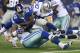 Sep 8, 2013; Arlington, TX, USA; New York Giants running back David Wilson (22) fumbles the ball in the third quarter against Dallas Cowboys defensive tackle Nick Hayden (96) and linebacker Sean Lee (50) at AT&T Stadium. Mandatory Credit: Matthew Emmons-USA TODAY Sports
