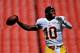 LANDOVER, MD - AUGUST 24: Quarterback Robert Griffin III #10 of the Washington Redskins warms up before playing the Buffalo Bills during a preseason game at FedExField on August 24, 2013 in Landover, Maryland. (Photo by Patrick Smith/Getty Images)