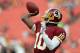 LANDOVER, MD - AUGUST 19: Quarterback Robert Griffin III #10 of the Washington Redskins warms up before the start of a preseason game against the Pittsburgh Steelers at FedExField on August 19, 2013 in Landover, Maryland. (Photo by Rob Carr/Getty Images)