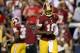 LANDOVER, MD - SEPTEMBER 09: Quarterback Robert Griffin III #10 of the Washington Redskins takes the field for the first time in the first quarter agianst the Philadelphia Eagles at FedExField on September 9, 2013 in Landover, Maryland. (Photo by Rob Carr/Getty Images)