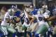 Sep 8, 2013; Arlington, TX, USA; New York Giants quarterback Eli Manning (10) is sacked in the fourth quarter against the Dallas Cowboys at AT&T Stadium. The Dallas Cowboys beat the New York Giants 36-31. Mandatory Credit: Matthew Emmons-USA TODAY Sports
