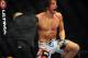 Jul 21, 2012; Calgary, AB, CANADA; Matt Riddle (blue gloves) celebrates defeating Chris Clements welterweight bout of UFC 149 at the Scotiabank Saddledome. Mandatory Credit: Anne-Marie Sorvin-USA TODAY Sports