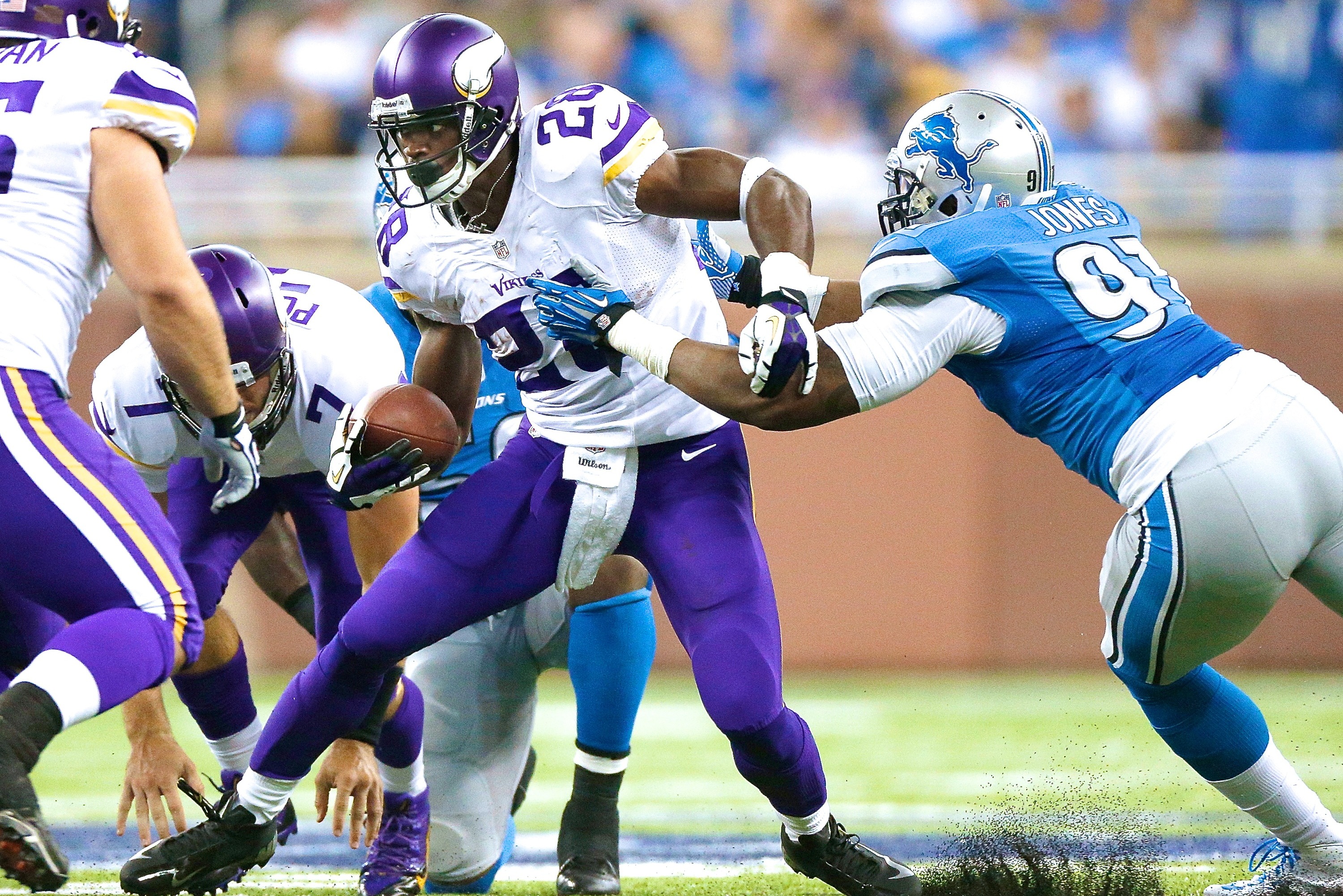 Adrian Peterson of the Detroit Lions leaves the field following a