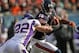 CHICAGO, IL - NOVEMBER 25: Brandon Marshall #15 of the Chicago Bears is hit by Harrison Smith #22 of the Minnesota Vikings at Soldier Field on November 25, 2012 in Chicago, Illinois. The Bears defeated the Vikings 28-10. (Photo by Jonathan Daniel/Getty Images)
