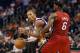 PHOENIX, AZ - NOVEMBER 17: Michael Beasley #0 of the Phoenix Suns handles the ball guarded by LeBron James #6 of the Miami Heat during the NBA game at US Airways Center on November 17, 2012 in Phoenix, Arizona. The Heat defeated the Suns 97-88. NOTE TO USER: User expressly acknowledges and agrees that, by downloading and or using this photograph, User is consenting to the terms and conditions of the Getty Images License Agreement. (Photo by Christian Petersen/Getty Images)