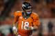 DENVER, CO - SEPTEMBER 5: Quarterback Peyton Manning #18 of the Denver Broncos walks off after going out on downs against the Baltimore Ravens during the game at Sports Authority Field at Mile High on September 5, 2013 in Denver Colorado. (Photo by Dustin Bradford/Getty Images)