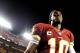 LANDOVER, MD - SEPTEMBER 09: Quarterback Robert Griffin III #10 of the Washington Redskins walks off the field after losing to the Philadelphia Eagles at FedExField on September 9, 2013 in Landover, Maryland. The Philadelphia Eagles won, 33-27. (Photo by Patrick Smith/Getty Images)