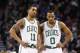 Feb 10, 2013; Boston, MA, USA; Boston Celtics shooting guard Courtney Lee (11) and point guard Avery Bradley (0) chate during the second half against the Denver Nuggets at TD Garden. Mandatory Credit: Mark L. Baer-USA TODAY Sports