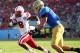PASADENA, CA - SEPTEMBER 08: Running back Ameer Abdullah #8 of the Nebraska Cornhuskers carries on a six yard touchdown run in the first quarter against linebacker Jordan Zumwalt #35 of the UCLA Bruins at the Rose Bowl on September 8, 2012 in Pasadena, California. (Photo by Stephen Dunn/Getty Images)