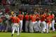 MIAMI, FL - SEPTEMBER 11: Jose Fernandez #16 of the Miami Marlins reacts to a fight after he hit a solo home run in the sixth inning during a game against the Atlanta Braves at Marlins Park on September 11, 2013 in Miami, Florida. (Photo by Mike Ehrmann/Getty Images)