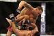 Jul 6, 2013; Las Vegas, NV, USA; Frankie Edgar and Charles Oliveira during their Featherweight Bout at the MGM Grand Garden Arena. Mandatory Credit: Jayne Kamin-Oncea-USA TODAY Sports