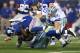 Sep 8, 2013; Arlington, TX, USA; New York Giants running back David Wilson (22) fumbles the ball in the third quarter against Dallas Cowboys defensive tackle Nick Hayden (96) and linebacker Sean Lee (50) at AT&T Stadium. Mandatory Credit: Matthew Emmons-USA TODAY Sports