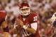 Sep 7, 2013; Norman, OK, USA; Oklahoma Sooners quarterback Blake Bell (10) in the pocket against the West Virginia Mountaineers at Gaylord Family - Oklahoma Memorial Stadium. Mandatory Credit: Matthew Emmons-USA TODAY Sports