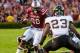 Sep 14, 2013; Columbia, SC, USA; South Carolina Gamecocks running back Mike Davis (28) runs for a gain as Vanderbilt Commodores defensive back Andre Hal (23) closes in in the first quarter at Williams-Brice Stadium. Mandatory Credit: Jeff Blake-USA TODAY Sports