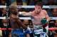 LAS VEGAS, NV - SEPTEMBER 14: (R-L) Canelo Alvarez throws a right at Floyd Mayweather Jr. during their WBC/WBA 154-pound title fight at the MGM Grand Garden Arena on September 14, 2013 in Las Vegas, Nevada. (Photo by Ethan Miller/Getty Images)