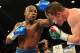 Sep 14, 2013; Las Vegas, NV, USA; Floyd Mayweather Jr. (blue gloves) and Canelo Alvarez battle it during their during their WBC and WBA super welterweight titles fight at MGM Grand Garden Arena. Mandatory Credit: Jayne Kamin-Oncea-USA TODAY Sports