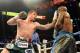 Sep 14, 2013; Las Vegas, NV, USA; Floyd Mayweather Jr. (blue gloves) and Canelo Alvarez battle it during their during their WBC and WBA super welterweight titles fight at MGM Grand Garden Arena. Mandatory Credit: Jayne Kamin-Oncea-USA TODAY Sports