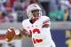 Sep 14, 2013; Berkeley, CA, USA; Ohio State Buckeyes quarterback Kenny Guiton (13) prepares to throw a touchdown pass against the California Golden Bears in the first quarter at Memorial Stadium. Mandatory Credit: Cary Edmondson-USA TODAY Sports