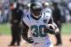 Sep 15, 2013; Oakland, CA, USA; Jacksonville Jaguars running back Jordan Todman (30) carries the ball during warm ups prior to the game against the Oakland Raiders at O.co Coliseum. Mandatory Credit: Kelley L Cox-USA TODAY Sports